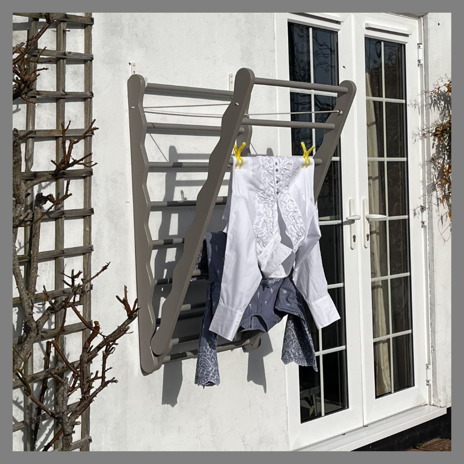 Julu Grey Laundry Ladder being used outside 