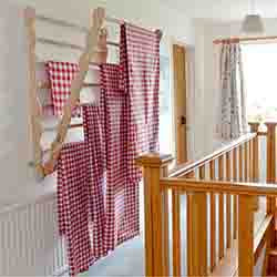 Super Clothes Airer shown on a landing.  Sold by Julu