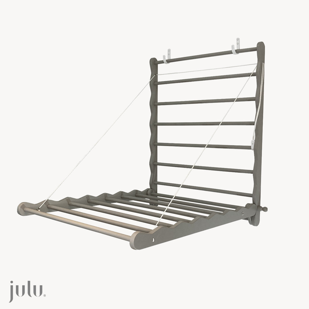 Image of Julu Doris wall mounted clothes drying rack in grey | cutout image showing fully open