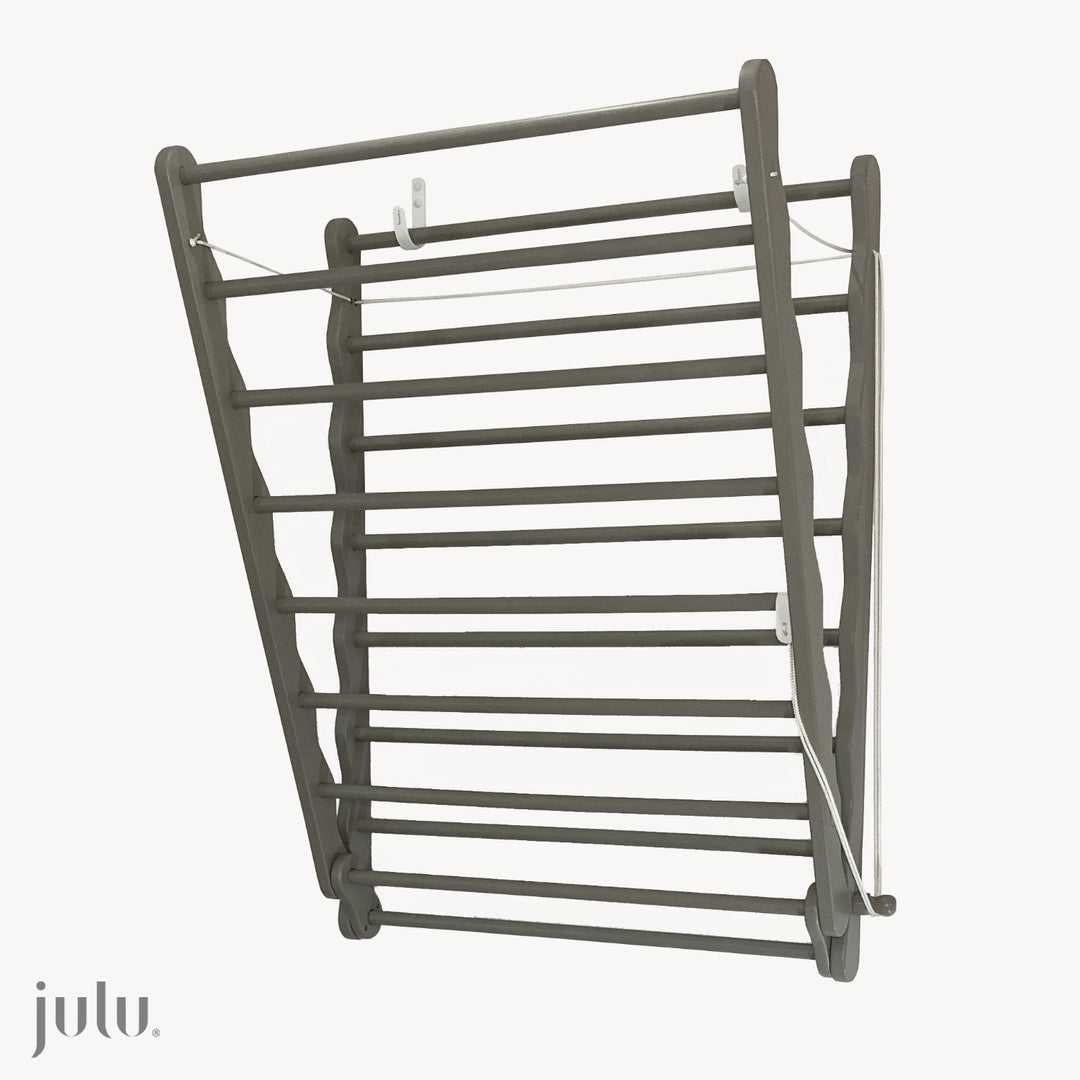 Image of Julu Doris wall mounted clothes drying rack in grey | cutout image showing partially  open