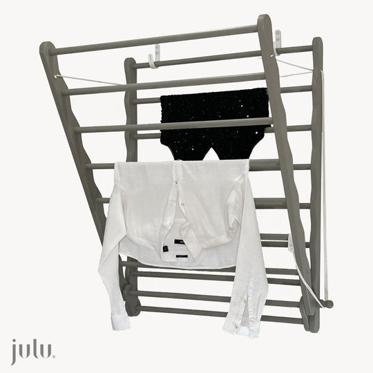 Image of Julu Doris wall mounted clothes drying rack in grey | cutout image showing with clothes drying