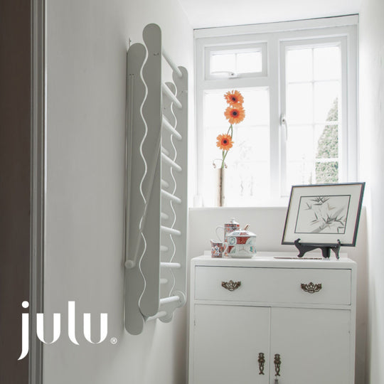 Photo of wall mounted clothes airer hanging  in narrow corridor by Julu