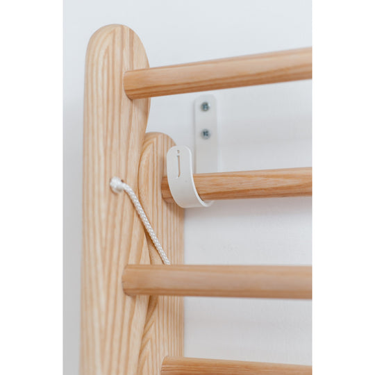 Image showing a julu bracket being used on a wall.  Sold by Julu for the Laundry Ladder