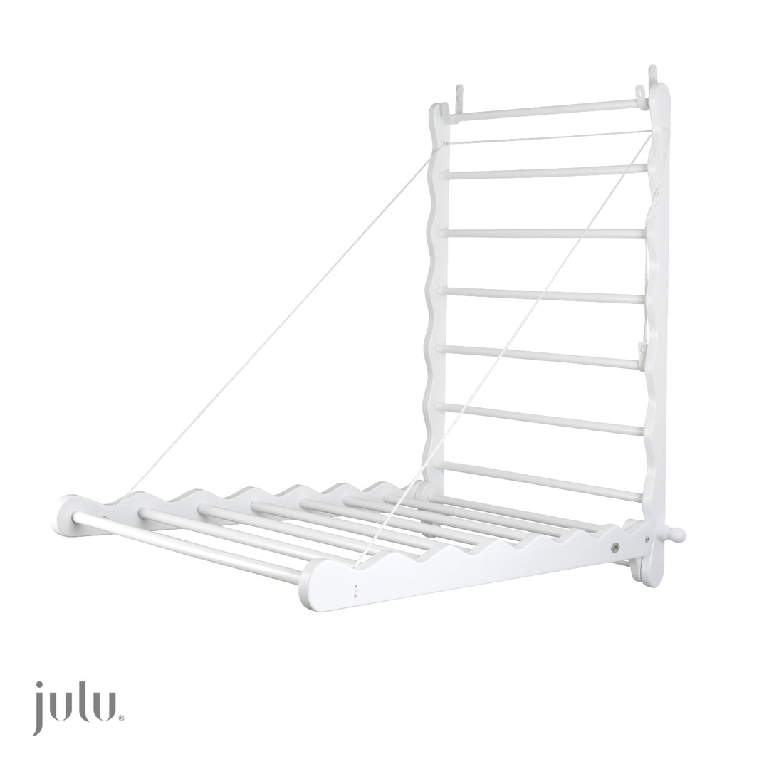 White Wooden Clothes Airer, Shown fully extended on a Wall.  Made by Julu