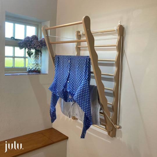 Image of wall mounted clothes dryer rack by Julu