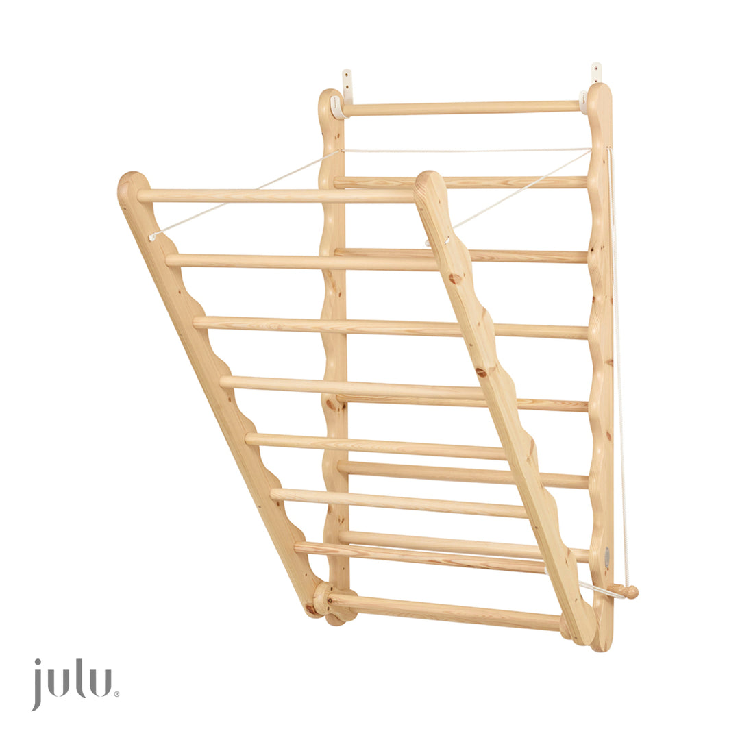 Slightly open wooden clothes drying rack.  Designed and made by Julu