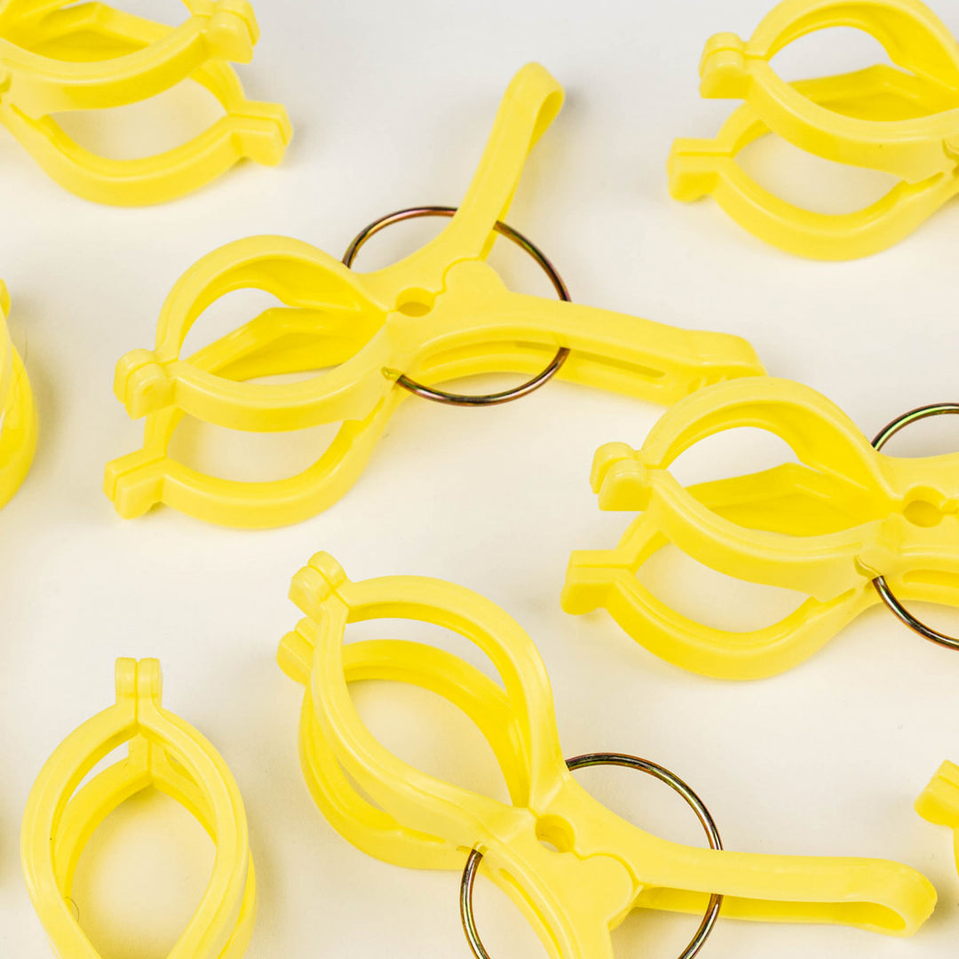 plastic yellow pegs sold by Julu