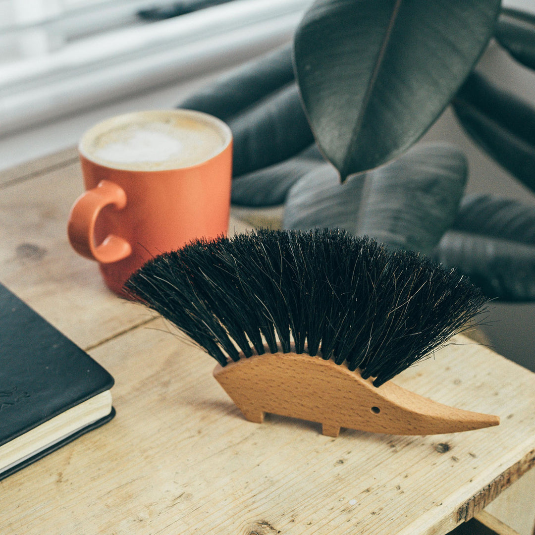 Dust off a table with this lovely hedgehog brush by Redecker. Sold by Julu