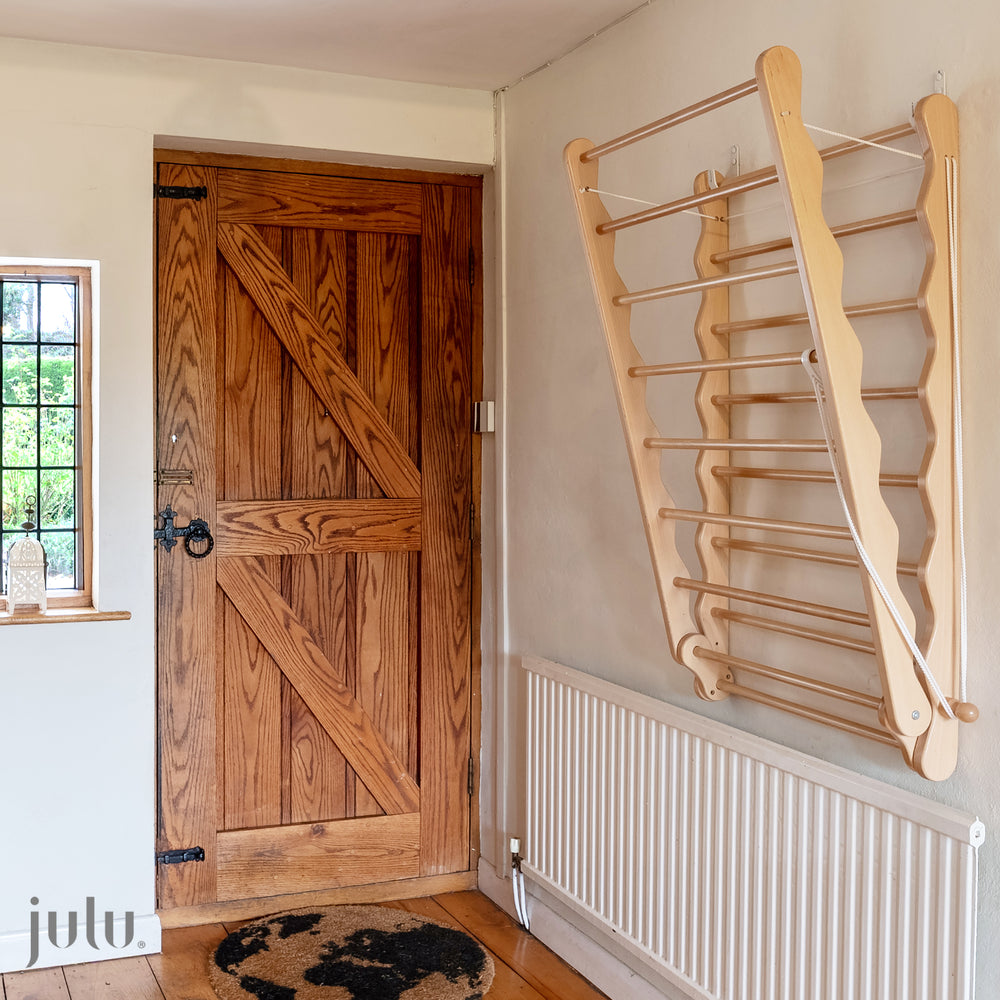 Image of Wall Mounted Clothes Dryer Rack hung in Hallway by Julu